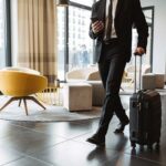 Businessman walking in hotel lobby