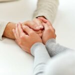 Young hands holding old hands